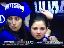 Female students react to the news in typically hysterical fashion.